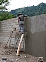 Pedro installs repello on the south wall