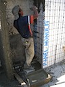 Installing concrete on the interior walls.